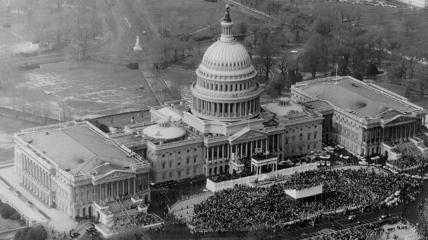 A crowd gathers outside the U.S. Capitol for Dwight D. Eisenhower's second presidential inauguration, in 1957. Ten other men have held the office during Dingell's time in Congress.