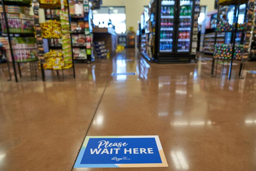 Grocery stores such as Kroger around the United States are using signage, plexiglass barriers and other measures to prevent the spread of the coronavirus disease COVID-19.