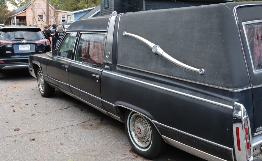 Hearse outside of house in Newtown