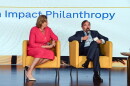 Jorge M. Perez, Chairman of the Related Group, and Jennifer O'Flannery Anderson, CEO of the Community Foundation of Broward, speak during a panel at the WLRN Sunshine Economy Summit in Fort Lauderdale on Sept. 23, 2026.