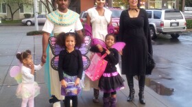 Elwyn McRoy and his family dress up for Halloween in 2012.
