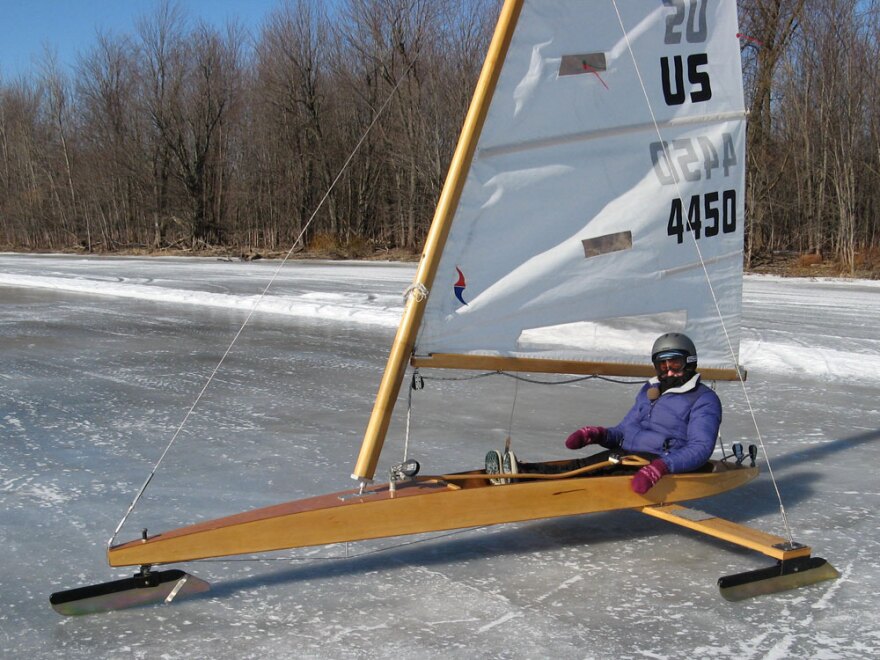  For her ride around the lake, reporter Sarah Harris claimed the ice boat's only seat while Sajor balanced the plank next to her. Together, they reached a top speed of about 48 miles an hour. 