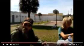 A screenshot taken of a Youtube video in which a Daytona Beach couple speaks with the area's homeless who allege Mike Pastore is pocketing cash donations for a shelter. Photo: Youtube.