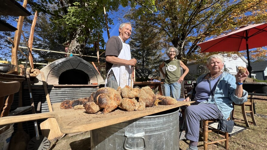 Emmett Leader (left) presided over his oven Saturday, Sept. 20, 2025 - pumping out simits on Main Street throughout Riverfest.