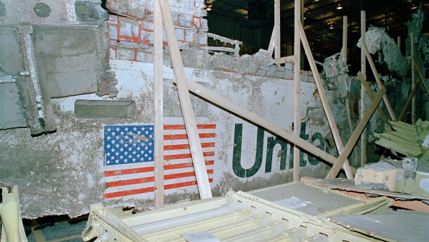 The left side of the Space Shuttle Challenger is seen in a hangar at Kennedy Space Center, Fla., April 9, 1986. Reporters and photographers were allowed to see the wreckage of the shuttle for the first time today. The Challenger exploded just after takeoff on Jan. 28, killing all seven crew members. (AP Photo/Doug Jennings)