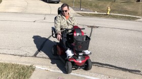 Pekin resident Perry Martin, who serves on the board for Advocates for Access, points out a sidewalk curb cut near his home. Pekin is working to implement a new Americans with Disabilities Act (ADA) Transition Plan to address needed upgrades throughout the city.
