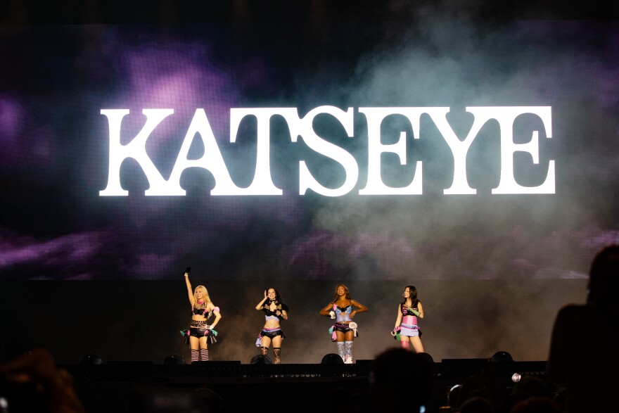 a group of four women performing music 