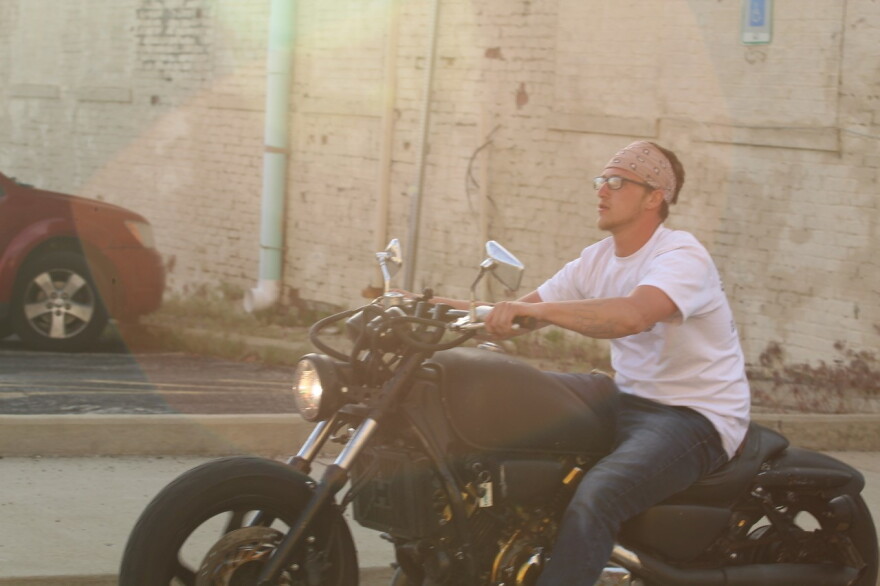 This photo, provided to WGLT by a demonstrator who witnessed the incident, shows the motorcyclist who allegedly drove into the crowd. Authorities say it was Marshall R. Blanchard of Bloomington.
