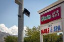 An automatic license plate reader camera on a traffic light pole in Salt Lake County, July 30, 2026.