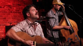 Perry Fowler singing as part of country-folk duo Sinners & Saints with bandmate Marc Baran.