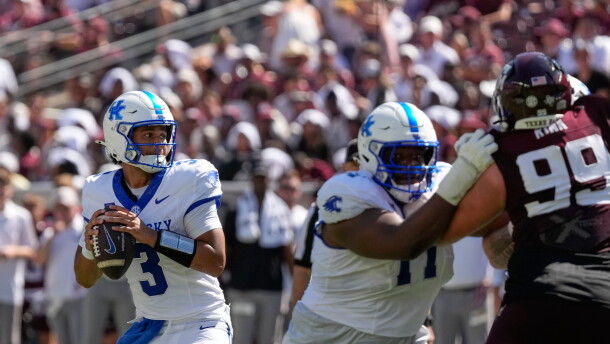 Kentucky quarterback Kenny Minchey (3) throws a pass against Texas A&M during the first half of an NCAA college football game Saturday, Sept. 19, 2026, in College Station, Texas. (AP Photo/David J. Phillip)