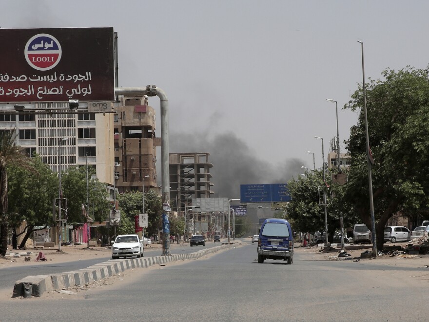 Smoke is seen rising from a neighborhood in Khartoum, Sudan, on Saturday. Fierce clashes between Sudan's military and the country's powerful paramilitary erupted in the capital and elsewhere in the African nation after weeks of escalating tensions.