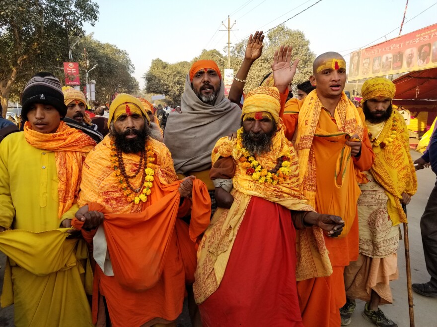 Hindu holy men sing and parade toward the banks of the Ganges River in January at the Kumbh Mela festival. Last year, the city hosting the festival changed its name from Allahabad to Prayagraj.