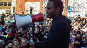 Derwin Montgomery speaks to the crowd during a George Floyd protest in downtown Winston-Salem in 2020. PAUL GARBER/WFDD