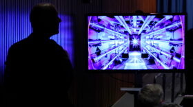 Guests await the beginning of a news conference with U.S. Energy Secretary Jennifer Granholm at the Department of Energy headquarters to announce a breakthrough in fusion research in Washington, DC.