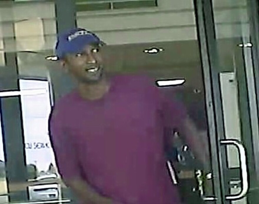 Picture of suspect leaving the credit union.