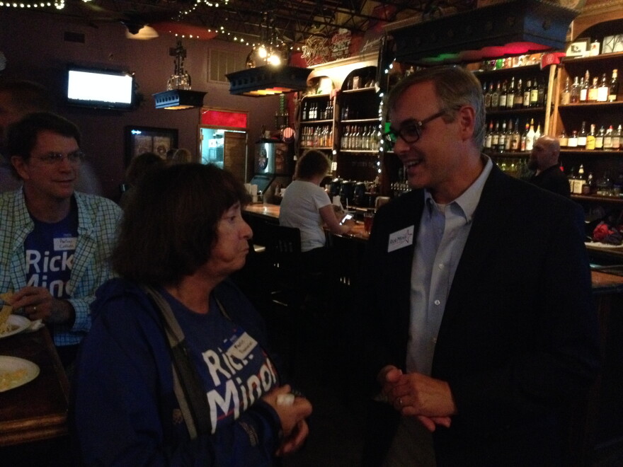 Rick Minor, winner of Leon County Commission Seat 3 race, speaks to a supporter.
