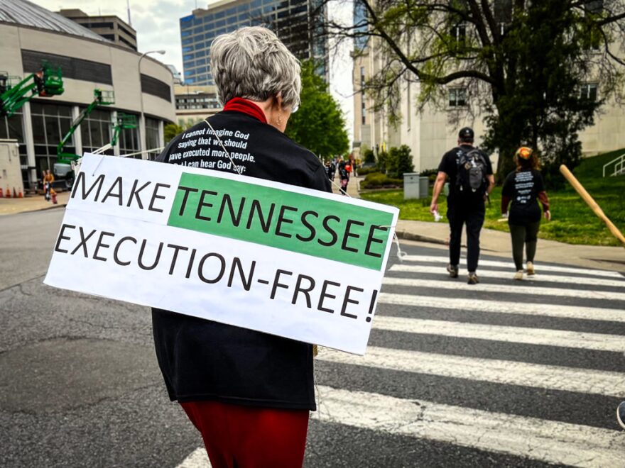 Protesters enter the last leg of the 9-mile walk from Riverbend Maximum Security Institution to War Memorial Plaza in an Easter Sunday anti-death penalty March4Mercy in 2022.
