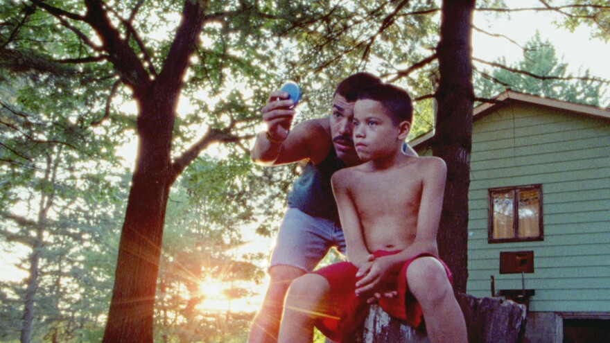 Jonah (Evan Rosado) is the youngest of three children who roam under the auspices of their father (Raul Castillo) in the film adaptation of <em>We the Animals.</em>