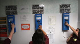 Incarcerated women make phone calls in Connecticut, the first state to make prison phone calls free.