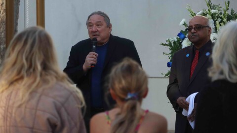 Cal State San Bernardino Professor Stuart Sumida, left, and Dr. Sastry Pantula, the dean of CSUSB’s College of Natural Sciences, speaking during the college's annual remembrance ceremony at the Peace Garden near the Chemical Sciences building on Tuesday, Dec. 2, 2025.