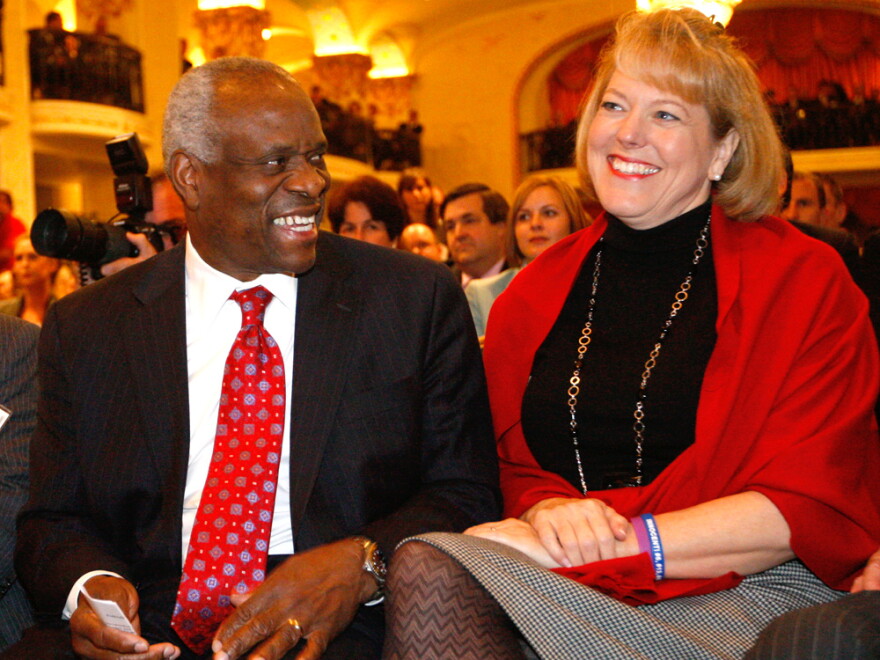 Justice Clarence Thomas with his wife, Virginia Lamp Thomas, in 2007. Under Supreme Court rules, Thomas would decide for himself when a conflict of interest arose in regard to his wife's political group.
