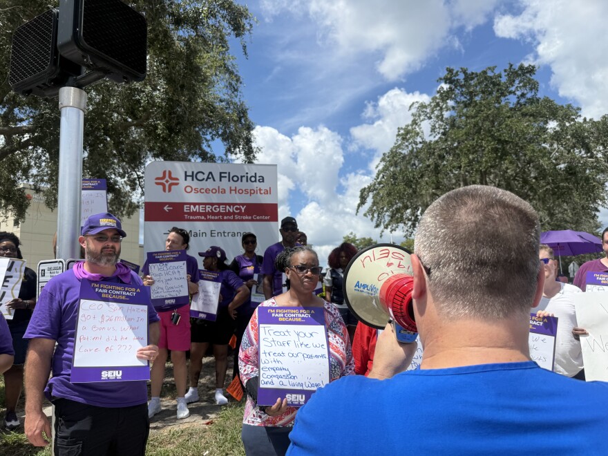 Healthcare workers and caregivers rally for better pay, safety and benefits outside of the HCA Florida Osceola Hospital in Kissimmee.