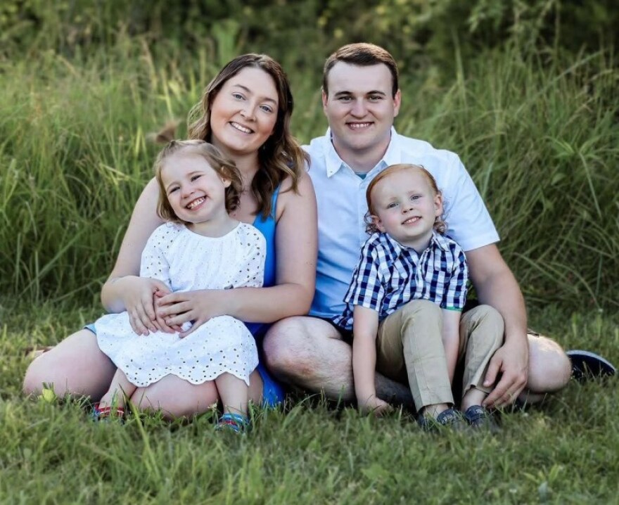 Alissa Gerber and her family pose for a portrait.