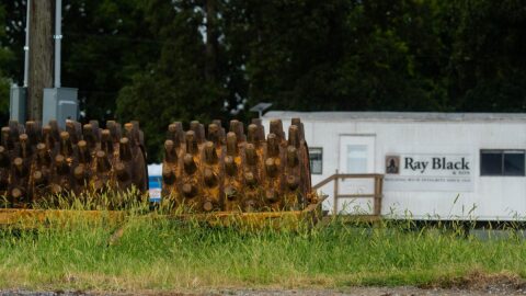 Ray Black & Sons, the current contractor for the building, is also named in the lawsuit.