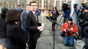 Washington Attorney General Bob Ferguson prepares to talk to the media about a federal judge's ruling on the Trump refugee order Friday, Feb. 3, 2017.
