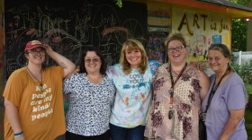 Abigail Larrison, center, and other organizers at the Community House Network, which operates at three different buildings on Sheridan and Thrush on Peoria's Center Bluff.