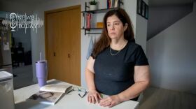 Amanda Gonzales stands in her home on April 22, 2026. Gonzales has been trying to get reinstated as a social studies teacher at Battle Ground High School since she was put on leave eight months ago.