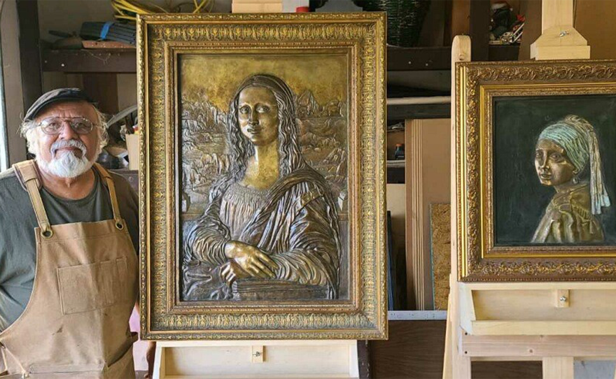 Tomas Bustos with his work, “Masterpiece: Relief for the Blind”