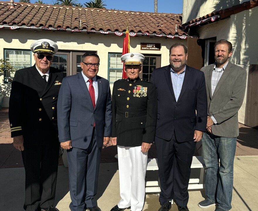 Democratic Congressman Salud Carbajal of Santa Barbara (second from left) with retired Brigadier General Frederick Lopez (third from left). Carbajal sponsored legislation to rename the post office after the Marine veteran.