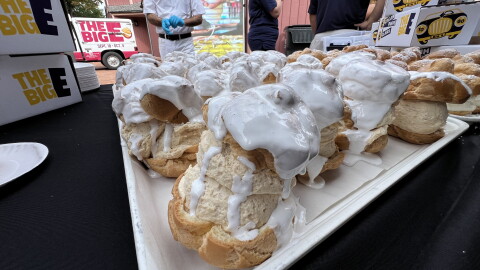 This year's renditions of The Big E's iconic cream puffs includes one with a "Fluffernutter" twist - peanut butter-infused cream with marshmallow sauce drizzled on top.
