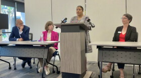 Attorney Jamilah Espinosa speaks about Charlotte's strained immigration resources during a press conference on Wednesday.