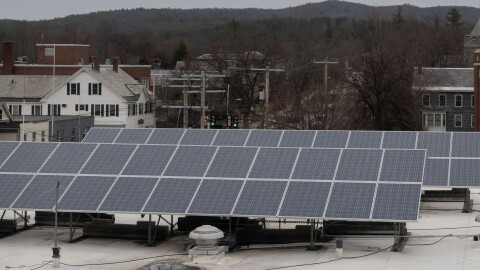 Solar panels are pictured on Wednesday, April 5, 2023, on the roof of the city hall in Keene, N.H. Raquel C. Zaldívar / New England News Collaborative