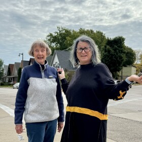Rita Herman and her daughter Amy Carlson looking for missing street signs