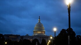 Early morning cloudy skies over the U.S. Capitol during the 8th day of the government shutdown on Wednesday, Oct. 8, 2025, in Washington. (AP Photo/John McDonnell)