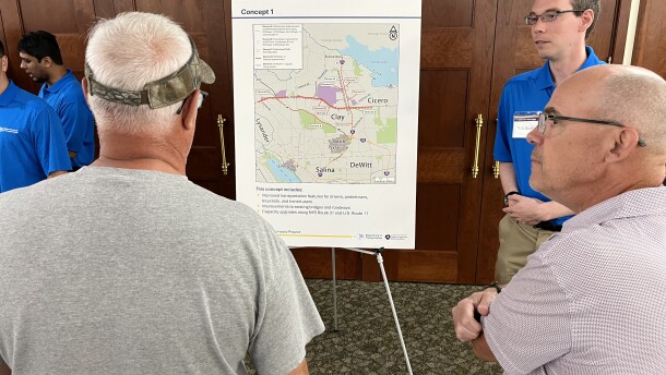 Residents discuss one of the concepts proposed by the state DOT at Thursday's public "scoping session."