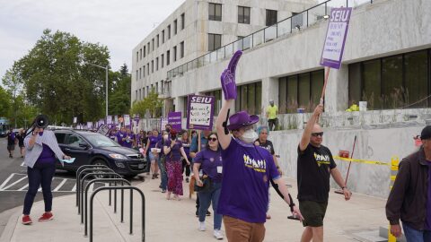 State workers march in front of the state Capitol on Thursday, June 8, 2023. More than 1,000 people attended the event, organized by the Service Employees International Union 503, to urge action on better pay for workers.