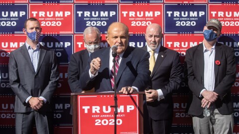Attorney for the president Rudy Giuliani speaks to the media at a press conference held in the back parking lot of a landscaping company over the weekend in Philadelphia.