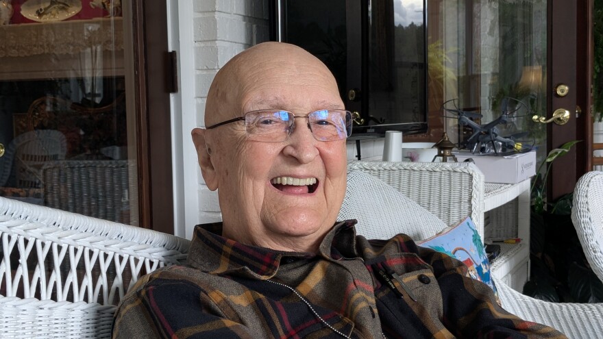 Dave Lang relaxing on the back porch of his Roberts Road home near Centerville.
