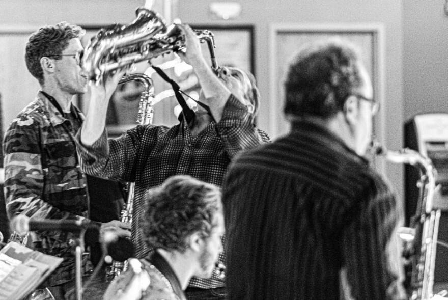 Saxophonist Russ Peterson doing what he does best, wailing on the sax. Peterson helps organize a regular jazz night Mondays at Fargo's Side Street Pub.