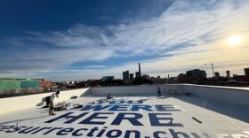 The United Methodist Church of the Resurrection has splashed a large welcome sign for World Cup athletes and fans on the roof of its campus in downtown Kansas City. It can be seen from airplanes and from nearby tall buildings and is part of the way this 10-campus church is readying for this summer’s World Cup competition in Kansas City.