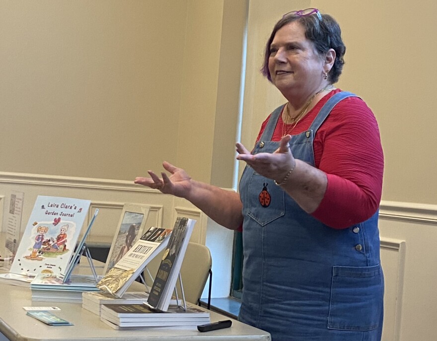 Doris Settles gives her talk 'My Dirty Life' to a group of people at the Erlanger Branch of the Kenton County Public Library