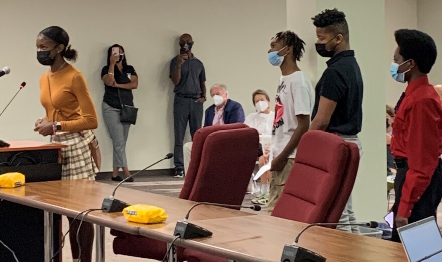 Sahara Williams, a Normal Community West High School student, and several other members of the city's youth enrichment program, speak to the Bloomington City Council on Monday, Aug. 23, 2021.