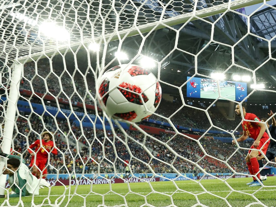 Belgium goalkeeper Thibaut Courtois, left, is beaten by a header from France's Samuel Umtiti for the opening goal during the semifinal match between France and Belgium at the 2018 soccer World Cup in St. Petersburg, Russia on Tuesday.