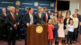 Representative Randy Fine and Senator Joe Gruters answer questions during a press conference relating to water problems caused by brown tide.