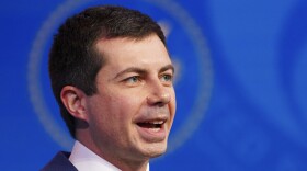 FILE - In this Dec. 16, 2020, file photo President-elect Joe Biden's nominee for Transportation Secretary former South Bend, Ind. Mayor Pete Buttigieg, President-elect speaks during a news conference at The Queen theater in Wilmington, Del.